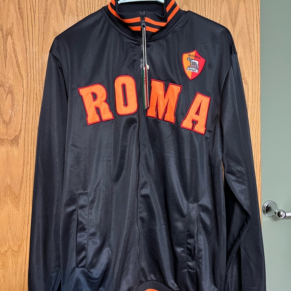Black ROMA jacket. New.
